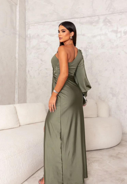 Woman wearing the Aria Women's One-Shoulder Dress, styled as a sophisticated party dress with a fitted silhouette and elegant gathered detail on the side.