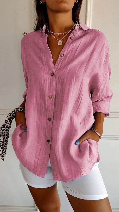 Stylish women's lightweight shirt with a relaxed fit, featuring button details and a casual, versatile design ideal for everyday wear.