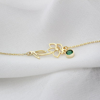 Close-up of the Lily Women's Floral Bracelet featuring a delicate floral pendant with a gemstone detail, showcasing its elegant and nature-inspired design.
