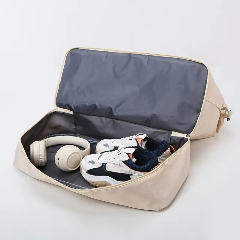 Women's travel bag with a spacious design, featuring sturdy handles, an adjustable strap, and smart compartments for organized storage. Perfect for weekend trips, gym sessions, or daily use, combining style and functionality for all your travel needs.