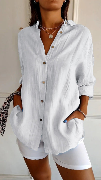 Stylish women's lightweight shirt with a relaxed fit, featuring button details and a casual, versatile design ideal for everyday wear.