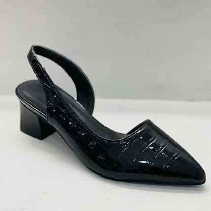 A pair of Amelia Women's Chic Block Heel Shoes with a stylish double-strap design and comfortable block heels, showcased to highlight their elegance and versatility for both casual and formal occasions.