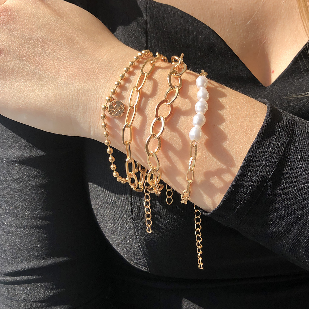 Close-up of a wrist adorned with the Ella Women's Layered Bracelet, showcasing its chic design with multiple layers and intricate details. A stylish accessory perfect for elevating any outfit.