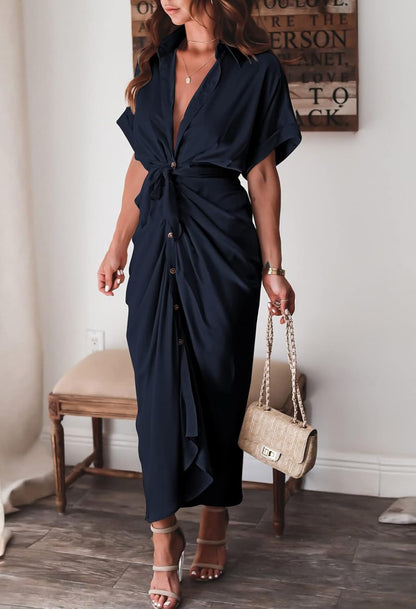 Woman wearing the Celeste Women's Kimono Sleeve Maxi Dress, a sophisticated party dress with elegant kimono sleeves and a fitted waist, standing gracefully in a stylish indoor setting.