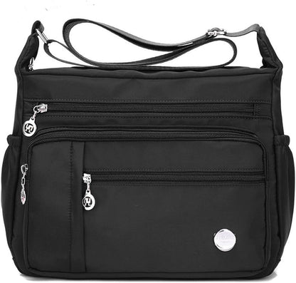  Functional multi-pocket bag with adjustable strap, multiple zippered compartments, and side pockets, offering ample space for daily essentials. Compact and lightweight design for easy carrying. Perfect for organization and travel use.