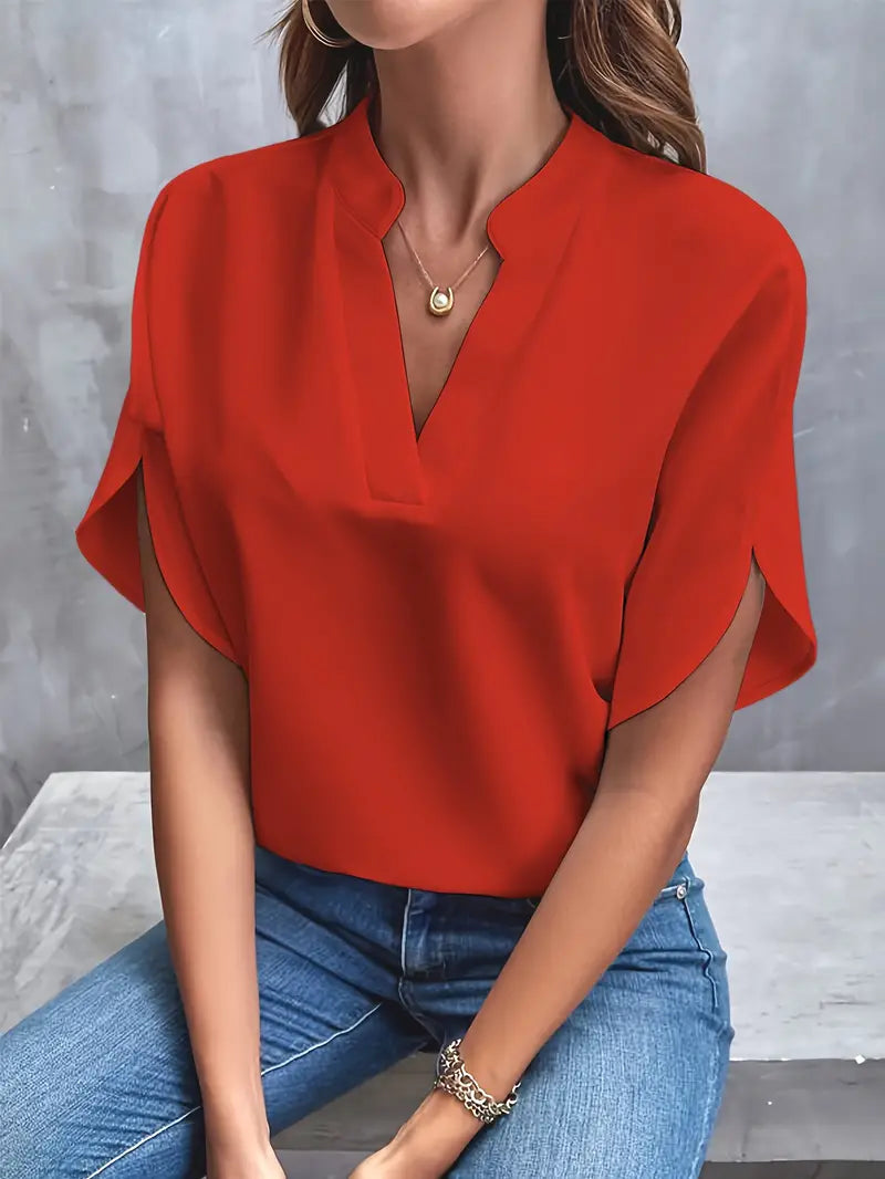 Image showing a woman wearing the Clara Women's Stylish Top, featuring a sleek and elegant design with a flattering neckline, paired with jeans for a chic and versatile look.