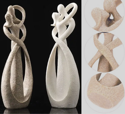 Elegant artistic sculptures showcasing intertwined figures, perfect for enhancing home décor with a touch of sophistication and timeless design.