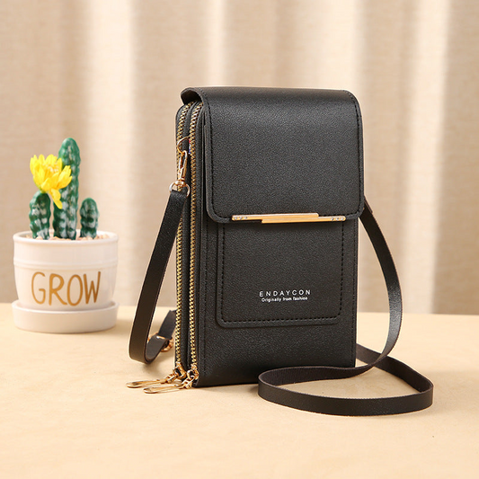 Image showing a compact and stylish women's crossbody bag with a sleek design, featuring a front flap, zipper closure, and an adjustable strap, ideal for carrying essentials on the go.
