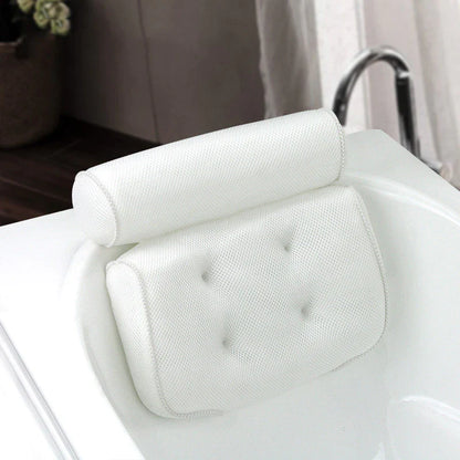 Bath pillow with ergonomic design featuring a cushioned headrest and padded back support, placed on a bathtub for enhanced comfort and relaxation.