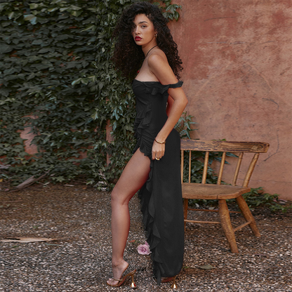 Women's elegant flowy dress with ruffled details, a square neckline, delicate shoulder straps, and a high slit for a sophisticated and stylish look.