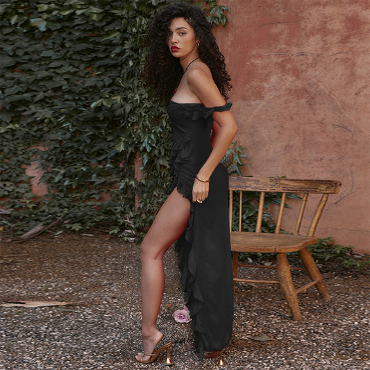 Women's elegant flowy dress with ruffled details, a square neckline, delicate shoulder straps, and a high slit for a sophisticated and stylish look.