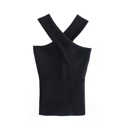 Women's elegant halter top with a fitted design, featuring a cross-over neckline for a stylish and sophisticated look.