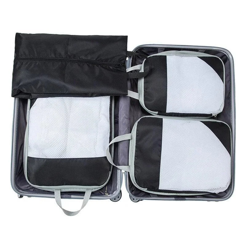  Travel organizer set displayed inside an open suitcase, featuring multiple compartments and pouches designed for compact and efficient packing. Ideal for organizing clothes and accessories during trips.