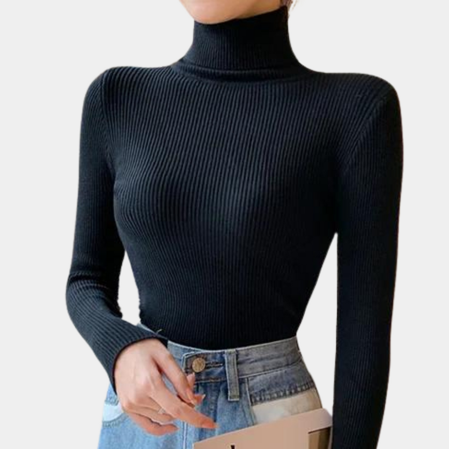 Model wearing the Sophia Women's Ribbed Turtleneck Top, showcasing its sleek, slim-fit design and high turtleneck style, paired with casual jeans.