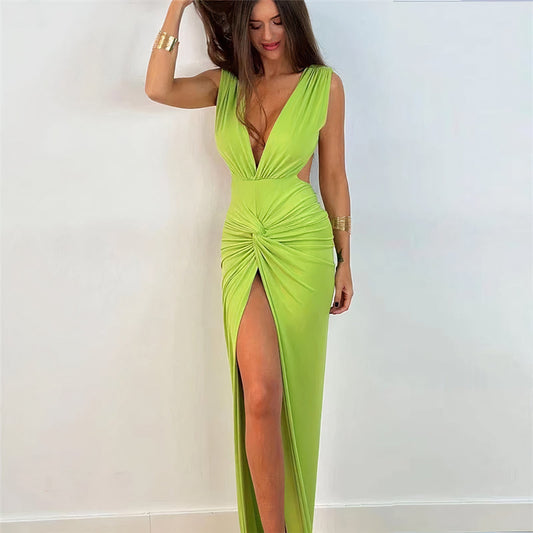  Woman wearing the Luna Women's Ruched High-Slit Dress, featuring a sleeveless design with a high slit and elegant ruched detailing, ideal for a sophisticated party look.