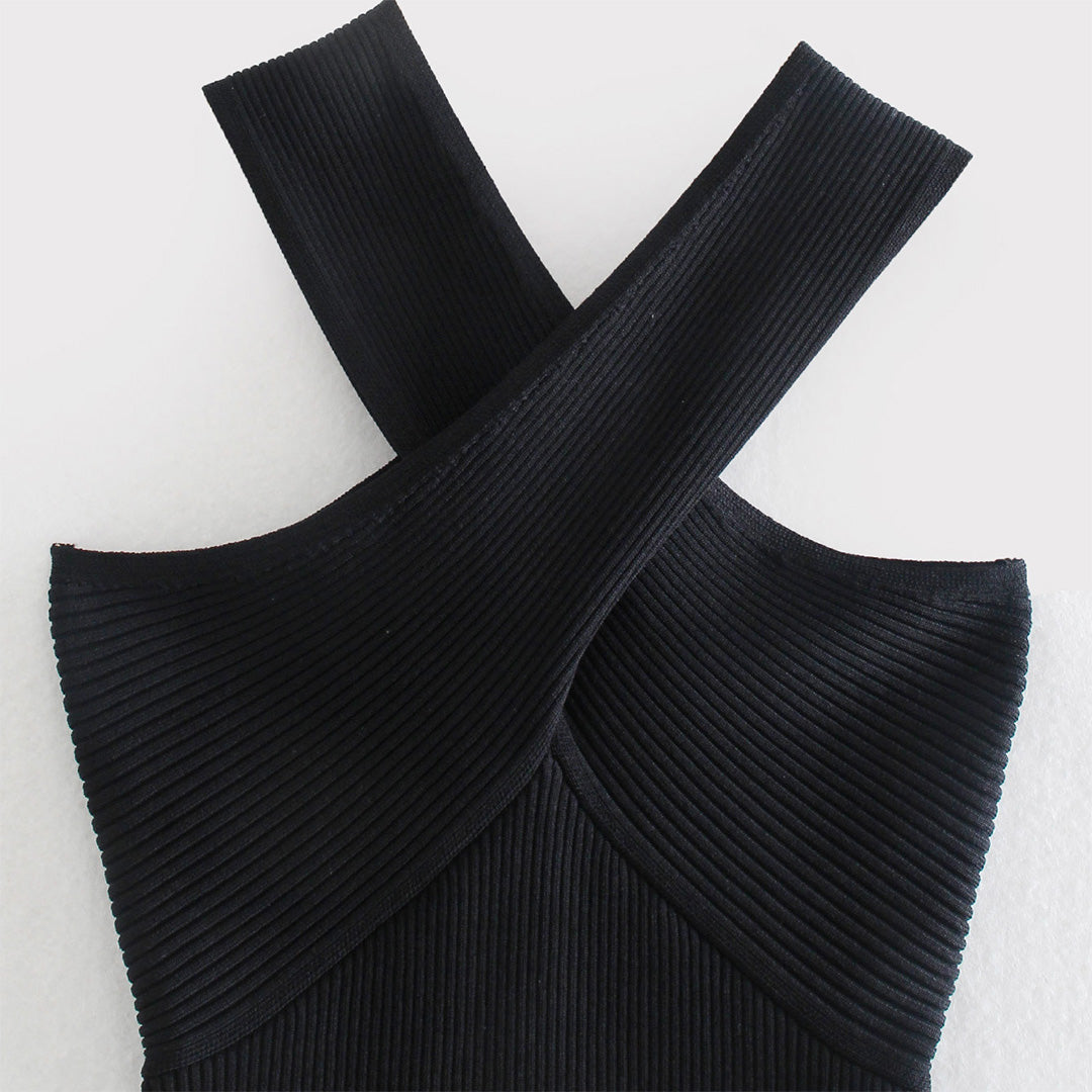 Women's elegant halter top with a fitted design, featuring a cross-over neckline for a stylish and sophisticated look.