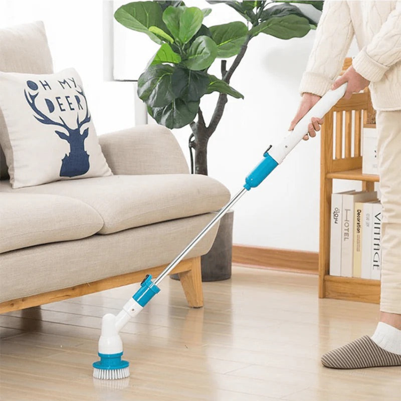 A versatile cleaning tool with a round scrubber head designed for efficient and thorough cleaning on various surfaces, shown in use on a shiny floor.