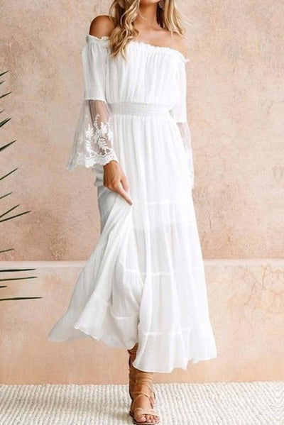 Model wearing the Amelia Women's Off-Shoulder Dress, featuring an elegant off-shoulder design, flowy silhouette, and delicate sleeve detailing, perfect for formal or casual occasions.