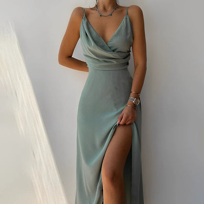 Woman wearing the Eva Women's Sleek Wrap Dress, featuring a high slit and elegant wrap design, perfect for evening events and formal occasions.