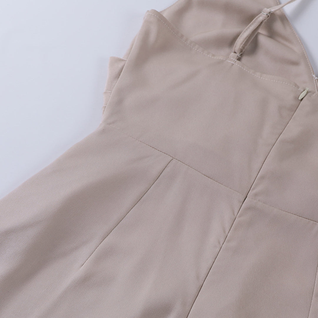 Woman wearing the Eva Women's Sleek Wrap Dress, featuring a high slit and elegant wrap design, perfect for evening events and formal occasions.