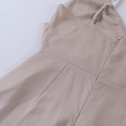 Woman wearing the Eva Women's Sleek Wrap Dress, featuring a high slit and elegant wrap design, perfect for evening events and formal occasions.