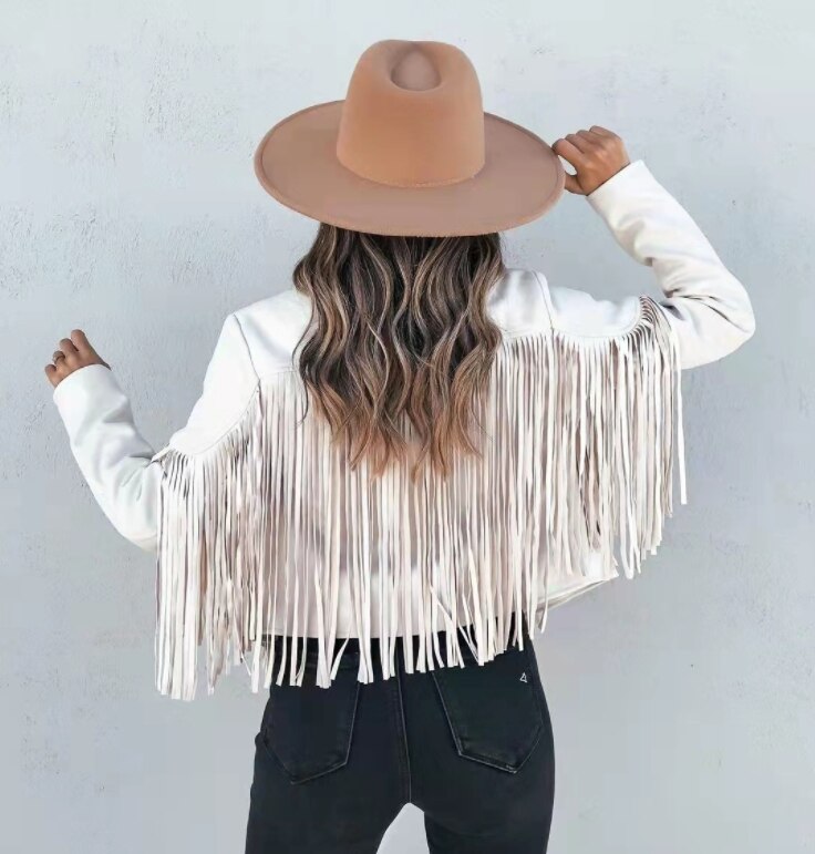 Woman wearing the Brooke | Stylish Fringe Detailed Jacket, styled with distressed jeans, ankle boots, and a casual top, showcasing the jacket’s fringe detail and trendy look perfect for casual and chic outfits.