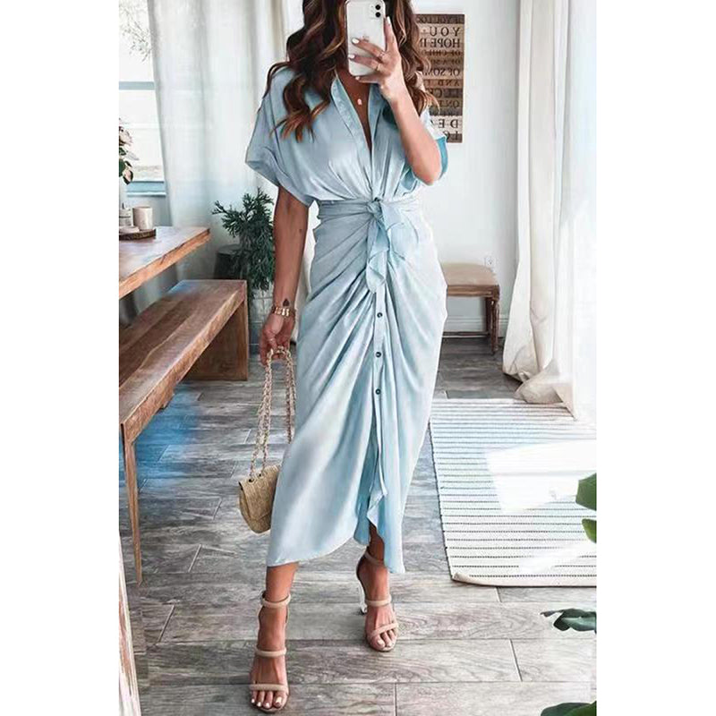 Woman wearing the Celeste Women's Kimono Sleeve Maxi Dress, a sophisticated party dress with elegant kimono sleeves and a fitted waist, standing gracefully in a stylish indoor setting.