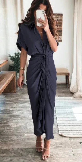 Woman wearing the Celeste Women's Kimono Sleeve Maxi Dress, a sophisticated party dress with elegant kimono sleeves and a fitted waist, standing gracefully in a stylish indoor setting.