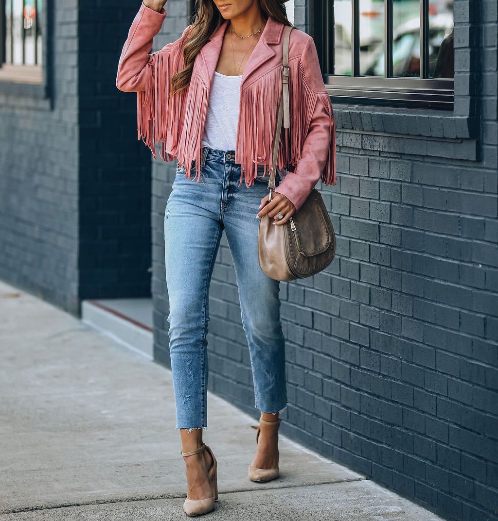 Woman wearing the Brooke | Stylish Fringe Detailed Jacket, styled with distressed jeans, ankle boots, and a casual top, showcasing the jacket’s fringe detail and trendy look perfect for casual and chic outfits.