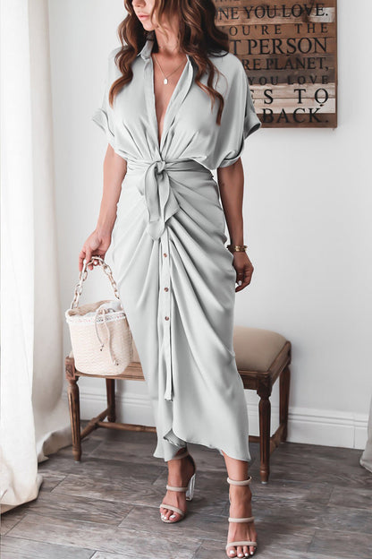 Woman wearing the Celeste Women's Kimono Sleeve Maxi Dress, a sophisticated party dress with elegant kimono sleeves and a fitted waist, standing gracefully in a stylish indoor setting.