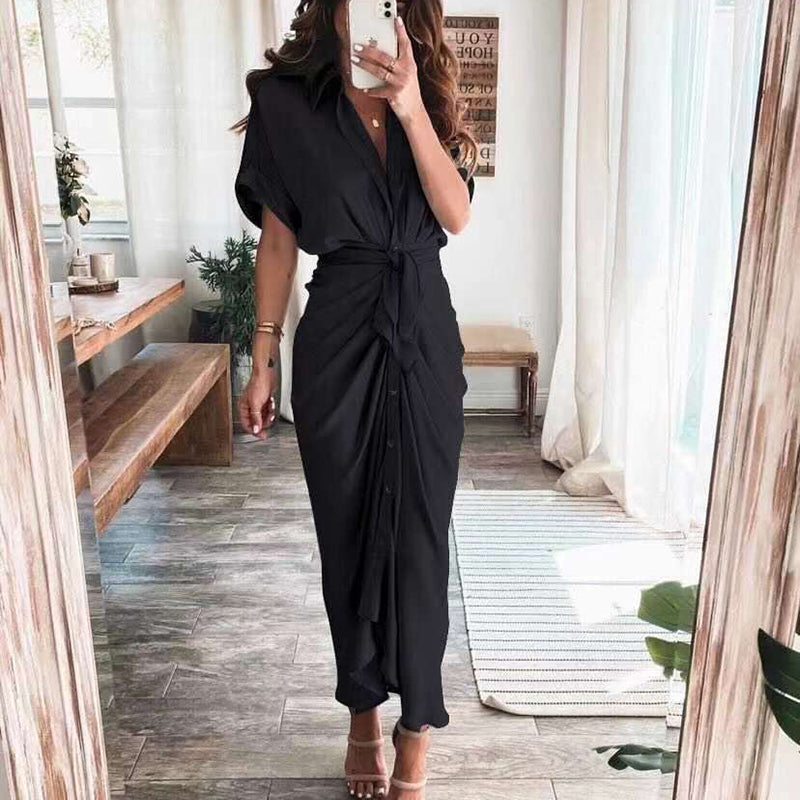 Woman wearing the Celeste Women's Kimono Sleeve Maxi Dress, a sophisticated party dress with elegant kimono sleeves and a fitted waist, standing gracefully in a stylish indoor setting.