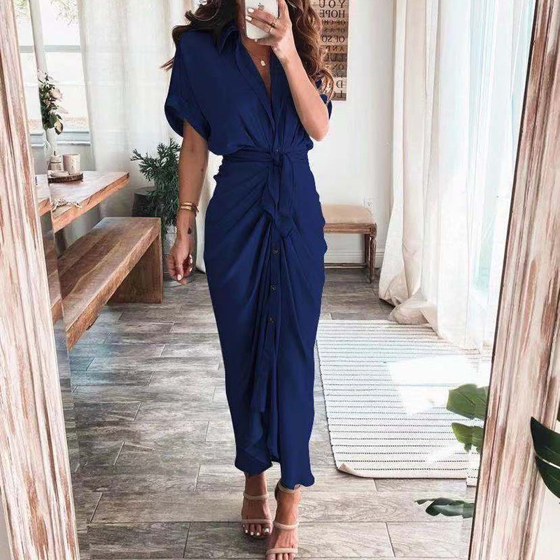 Woman wearing the Celeste Women's Kimono Sleeve Maxi Dress, a sophisticated party dress with elegant kimono sleeves and a fitted waist, standing gracefully in a stylish indoor setting.