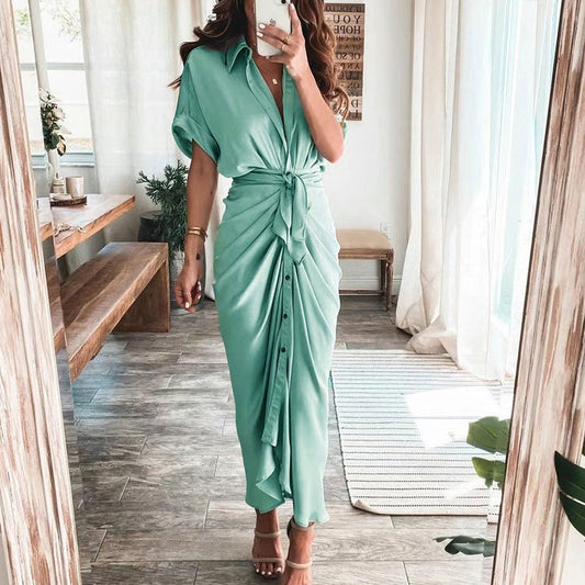 Woman wearing the Celeste Women's Kimono Sleeve Maxi Dress, a sophisticated party dress with elegant kimono sleeves and a fitted waist, standing gracefully in a stylish indoor setting.