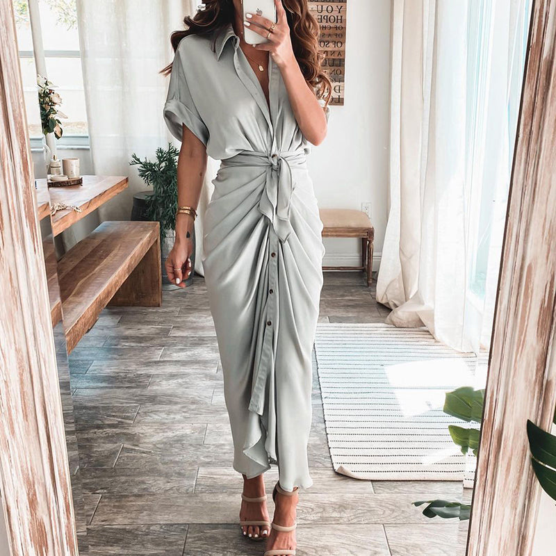 Woman wearing the Celeste Women's Kimono Sleeve Maxi Dress, a sophisticated party dress with elegant kimono sleeves and a fitted waist, standing gracefully in a stylish indoor setting.