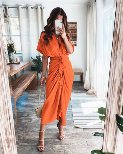 Woman wearing the Celeste Women's Kimono Sleeve Maxi Dress, a sophisticated party dress with elegant kimono sleeves and a fitted waist, standing gracefully in a stylish indoor setting.