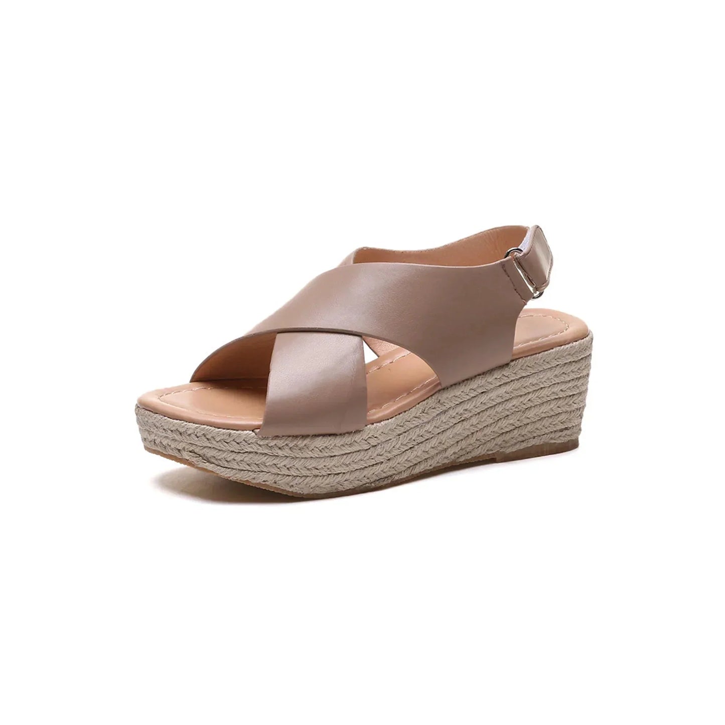 A close-up of a pair of Elena Women's Elegant Wedge Sandals being worn, featuring a stylish cross-strap design and a comfortable wedge sole. These sandals offer a blend of elegance and comfort, ideal for casual or dressy occasions.