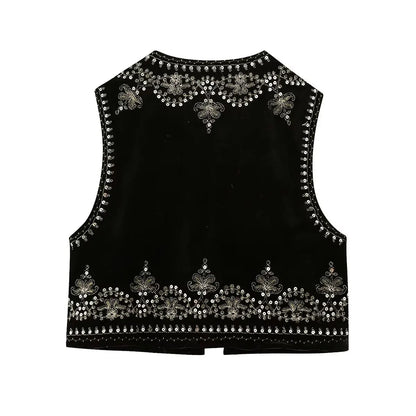 Sleeveless women's vest featuring intricate embellishments and bohemian-inspired detailing, adding a touch of elegance and unique style to any outfit.