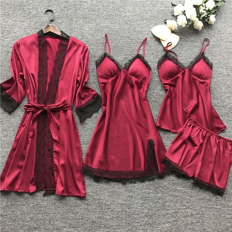 A luxurious 5-piece satin lingerie set featuring a robe, slip dress, camisole, shorts, and nightgown. Each piece is designed with delicate lace detailing and adjustable straps, offering both comfort and elegance for nighttime wear. Perfect for lounging or special occasions.