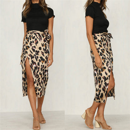 Model wearing the Samantha | Animal Print Wrap Skirt, featuring a bold animal print pattern and a flattering wrap design. This chic skirt adds a fierce touch to any outfit, perfect for day or night occasions.