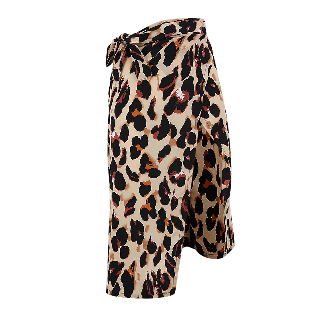 Model wearing the Samantha | Animal Print Wrap Skirt, featuring a bold animal print pattern and a flattering wrap design. This chic skirt adds a fierce touch to any outfit, perfect for day or night occasions.