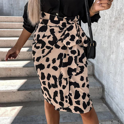 Model wearing the Samantha | Animal Print Wrap Skirt, featuring a bold animal print pattern and a flattering wrap design. This chic skirt adds a fierce touch to any outfit, perfect for day or night occasions.