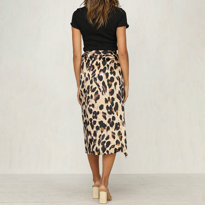 Model wearing the Samantha | Animal Print Wrap Skirt, featuring a bold animal print pattern and a flattering wrap design. This chic skirt adds a fierce touch to any outfit, perfect for day or night occasions.