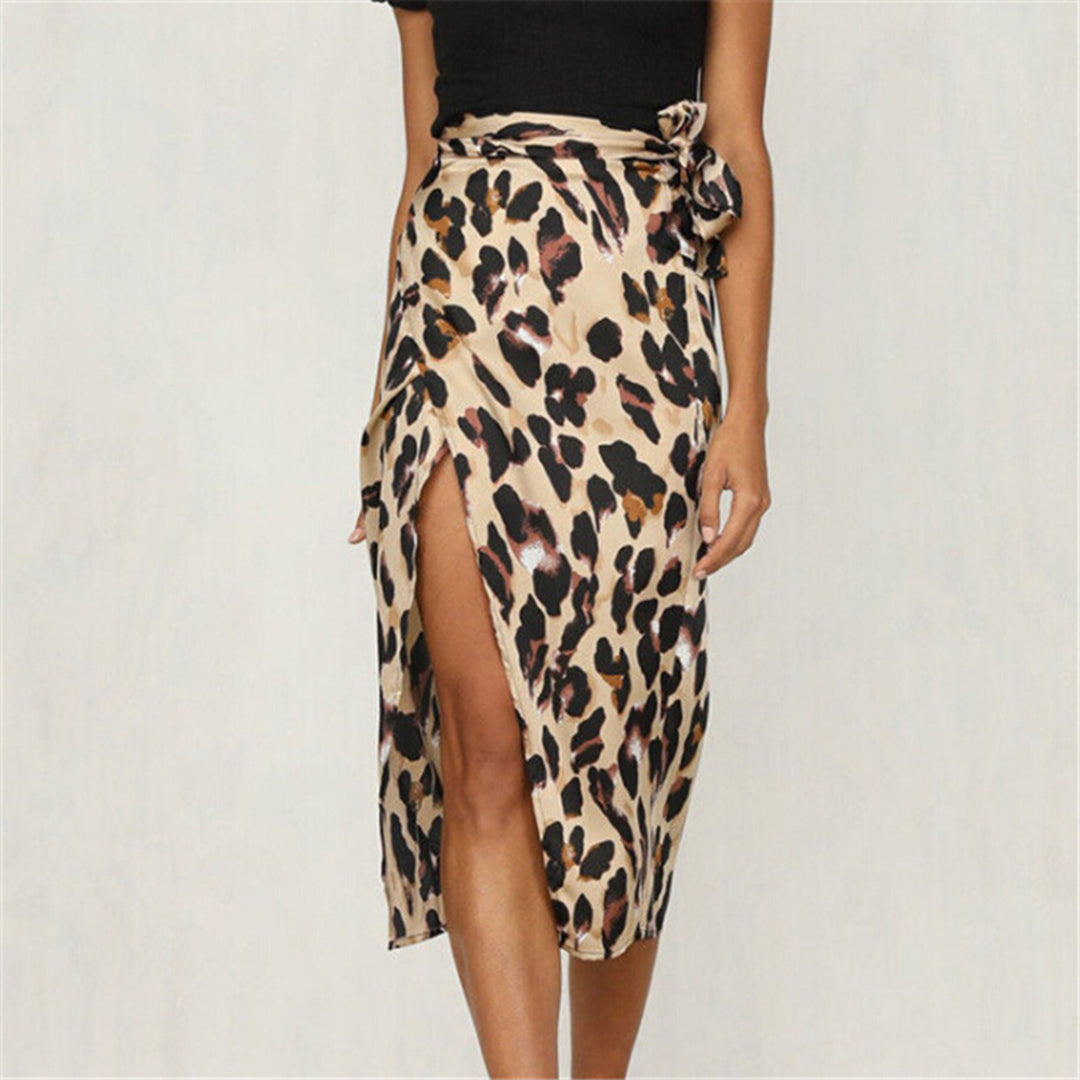 Model wearing the Samantha | Animal Print Wrap Skirt, featuring a bold animal print pattern and a flattering wrap design. This chic skirt adds a fierce touch to any outfit, perfect for day or night occasions.