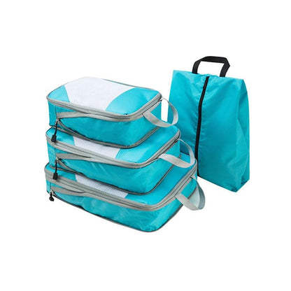  Travel organizer set displayed inside an open suitcase, featuring multiple compartments and pouches designed for compact and efficient packing. Ideal for organizing clothes and accessories during trips.