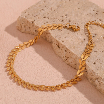 Close-up of a delicate link bracelet with a refined design, showcasing an elegant and timeless style for women.