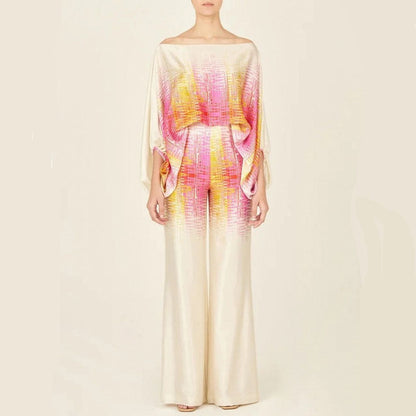 Women's summer jumpsuit with a flowing, one-shoulder design featuring vibrant patterns. Perfect for casual outings, beach days, or evening events, combining elegance and comfort for a chic summer look.