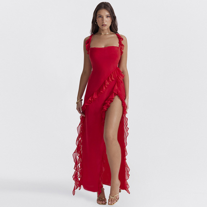 Women's elegant flowy dress with ruffled details, a square neckline, delicate shoulder straps, and a high slit for a sophisticated and stylish look.