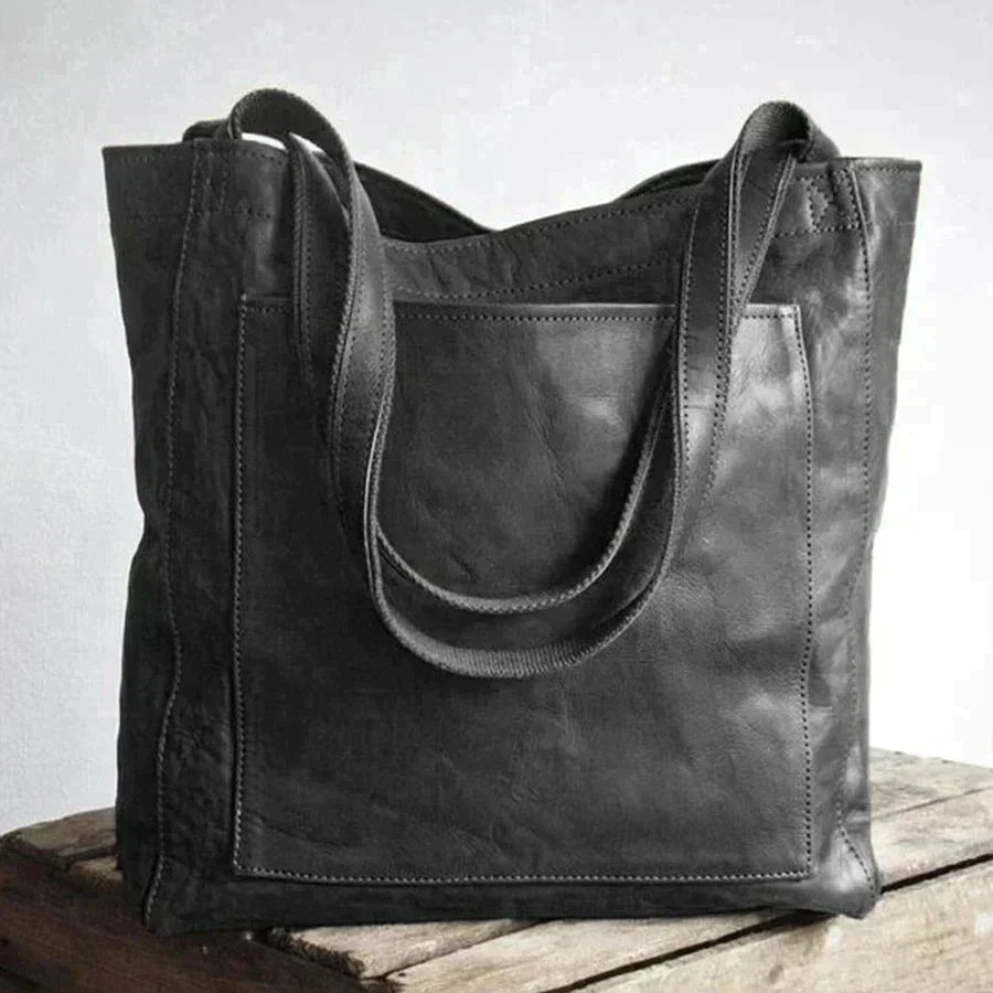 A premium leather handbag featuring a spacious design with sturdy handles, perfect for everyday use or special occasions. Ideal for the Sophia | Women's Stylish Handbag | Premium Leather Handbag.