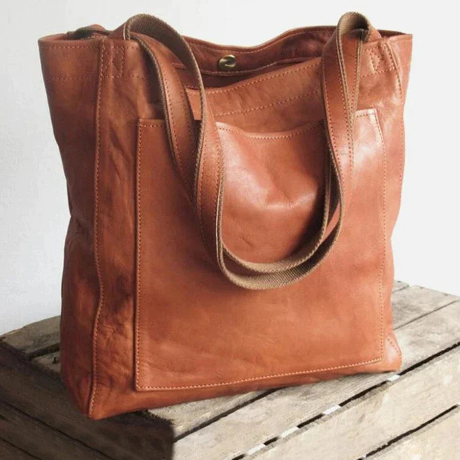 A premium leather handbag featuring a spacious design with sturdy handles, perfect for everyday use or special occasions. Ideal for the Sophia | Women's Stylish Handbag | Premium Leather Handbag.