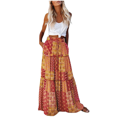 Model wearing the Sienna Women's Bohemian Skirt, featuring a tiered maxi design with a flowy silhouette, styled with a casual top and accessories for a boho-chic look.